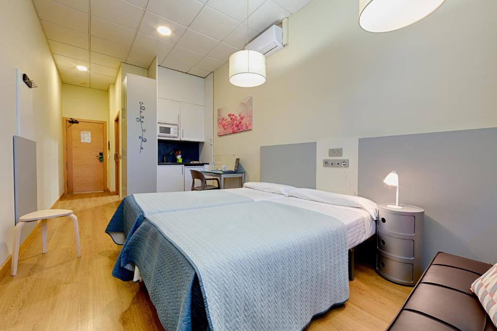 Cama o camas de una habitación en OK Estudios Plata