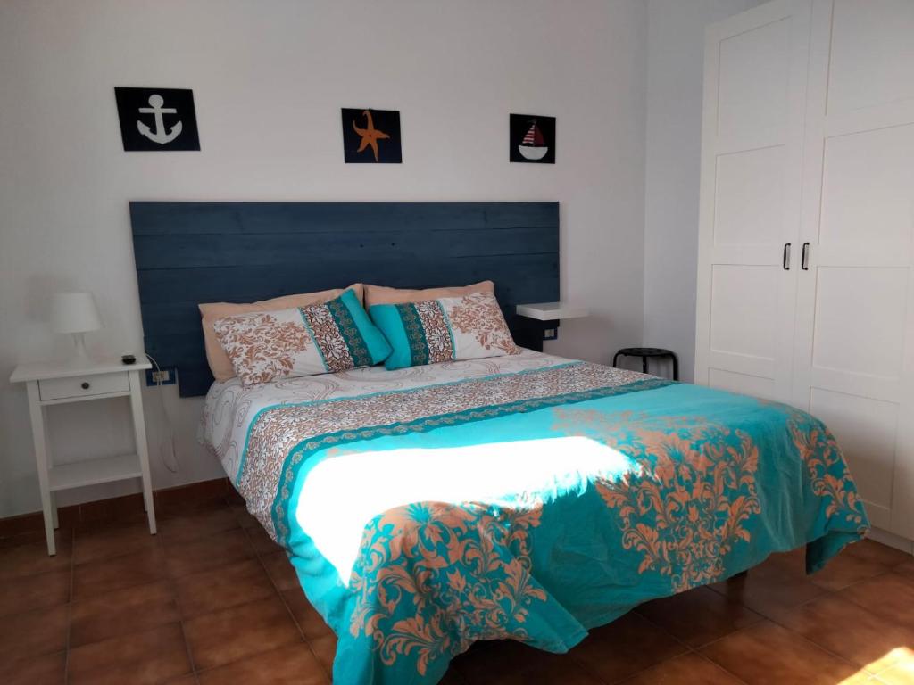 Posteľ alebo postele v izbe v ubytovaní Casa Pichón la Piscina