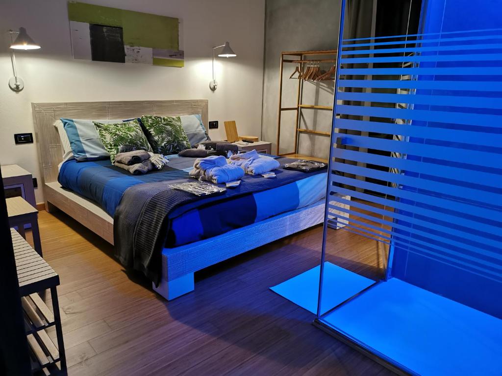 Posteľ alebo postele v izbe v ubytovaní Chalet Bornhome relax, sport e cultura altopiano del sole 6 ospiti - pet Frendly