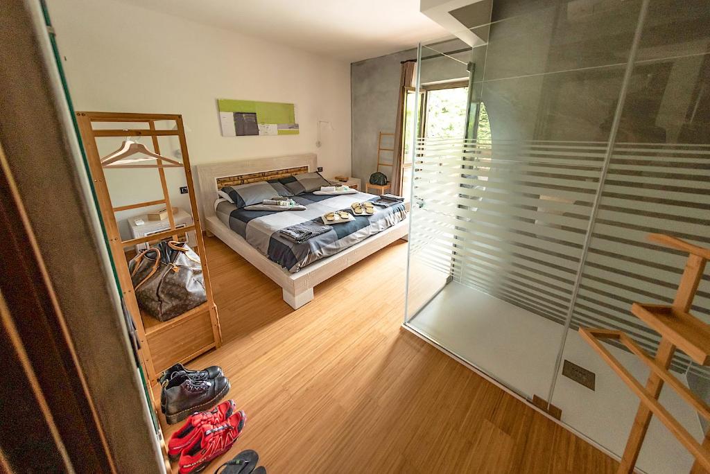Posteľ alebo postele v izbe v ubytovaní Chalet Bornhome relax, sport e cultura altopiano del sole 6 ospiti - pet Frendly