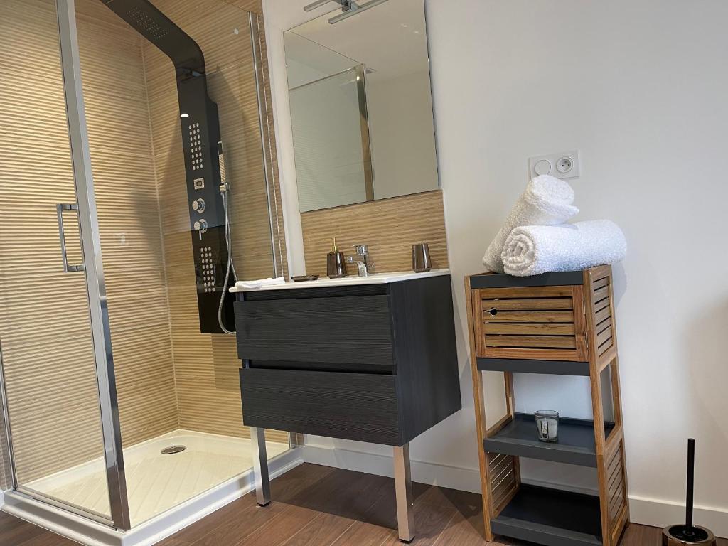Koupelna v ubytování Les Appartements du Cep’t