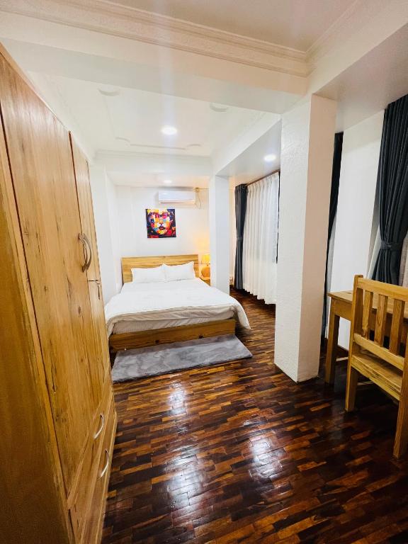Postel nebo postele na pokoji v ubytování Newa service apartment