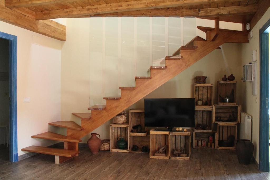 TV a/nebo společenská místnost v ubytování Casa Rural El Peral