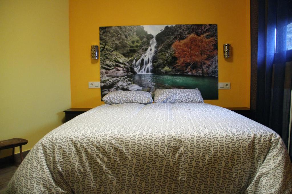 Postel nebo postele na pokoji v ubytování Casa Rural El Peral