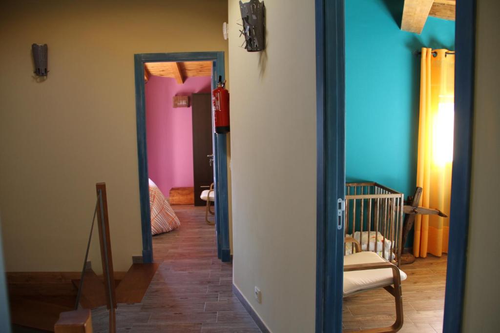 Postel nebo postele na pokoji v ubytování Casa Rural El Peral