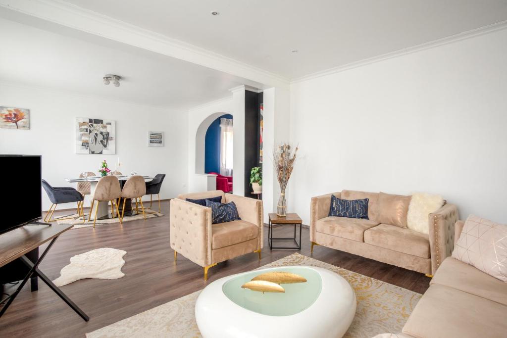 Posezení v ubytování L'Amarante - Appt 2 chambres - proche Strasbourg