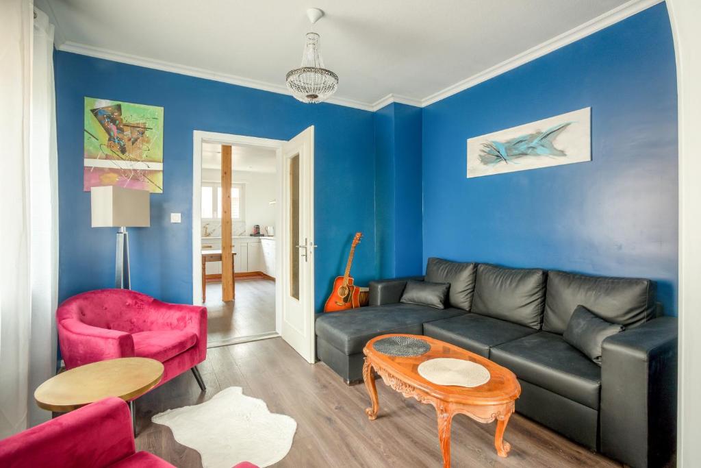 Posezení v ubytování L'Amarante - Appt 2 chambres - proche Strasbourg