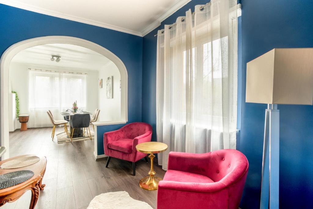Posezení v ubytování L'Amarante - Appt 2 chambres - proche Strasbourg