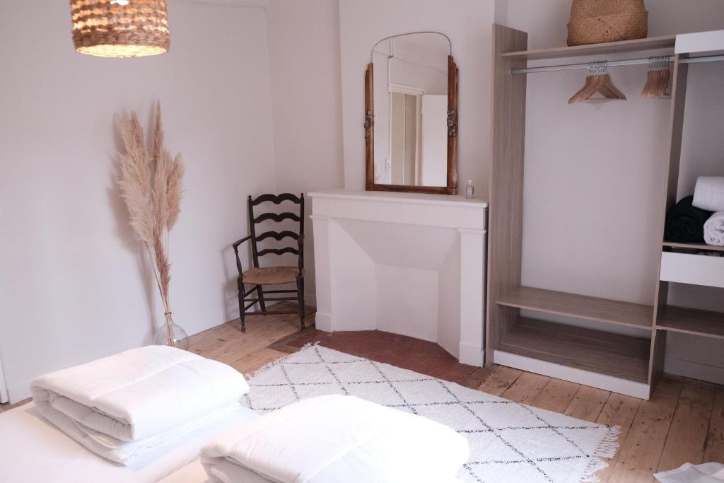 Postel nebo postele na pokoji v ubytování Gîte le petit écolier