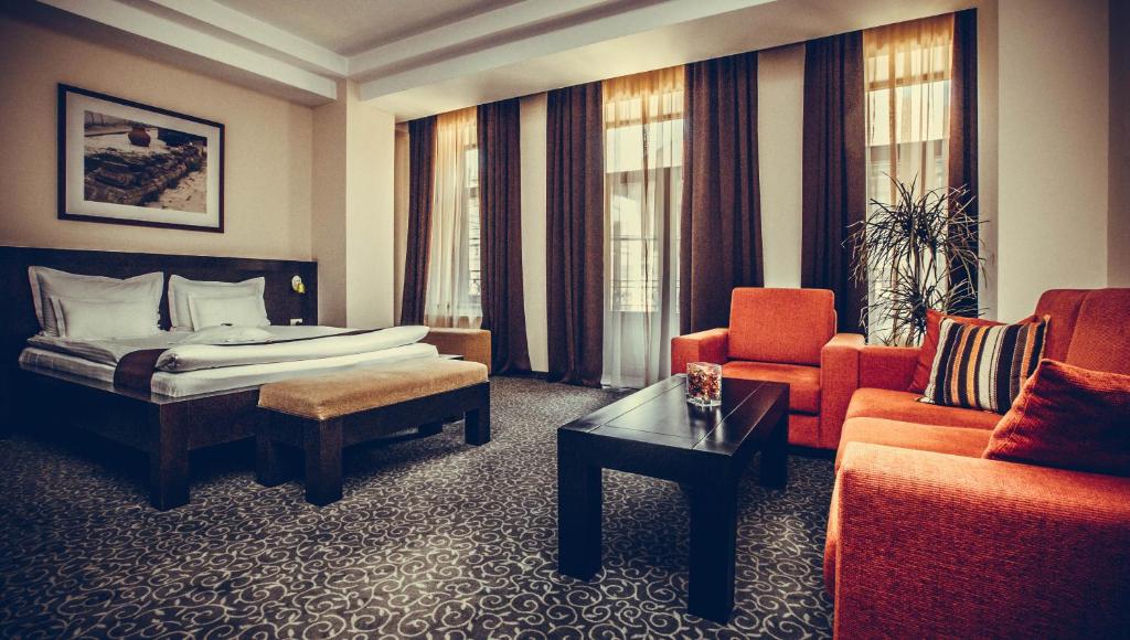 Postel nebo postele na pokoji v ubytování Hotel Cherica
