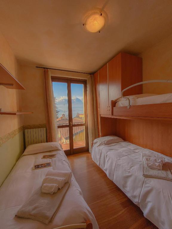 Posteľ alebo postele v izbe v ubytovaní Garden Villa Valentina