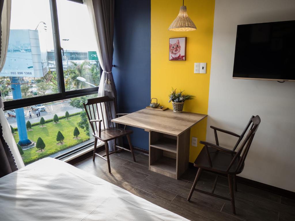 Ein Bett oder Betten in einem Zimmer der Unterkunft Wings House