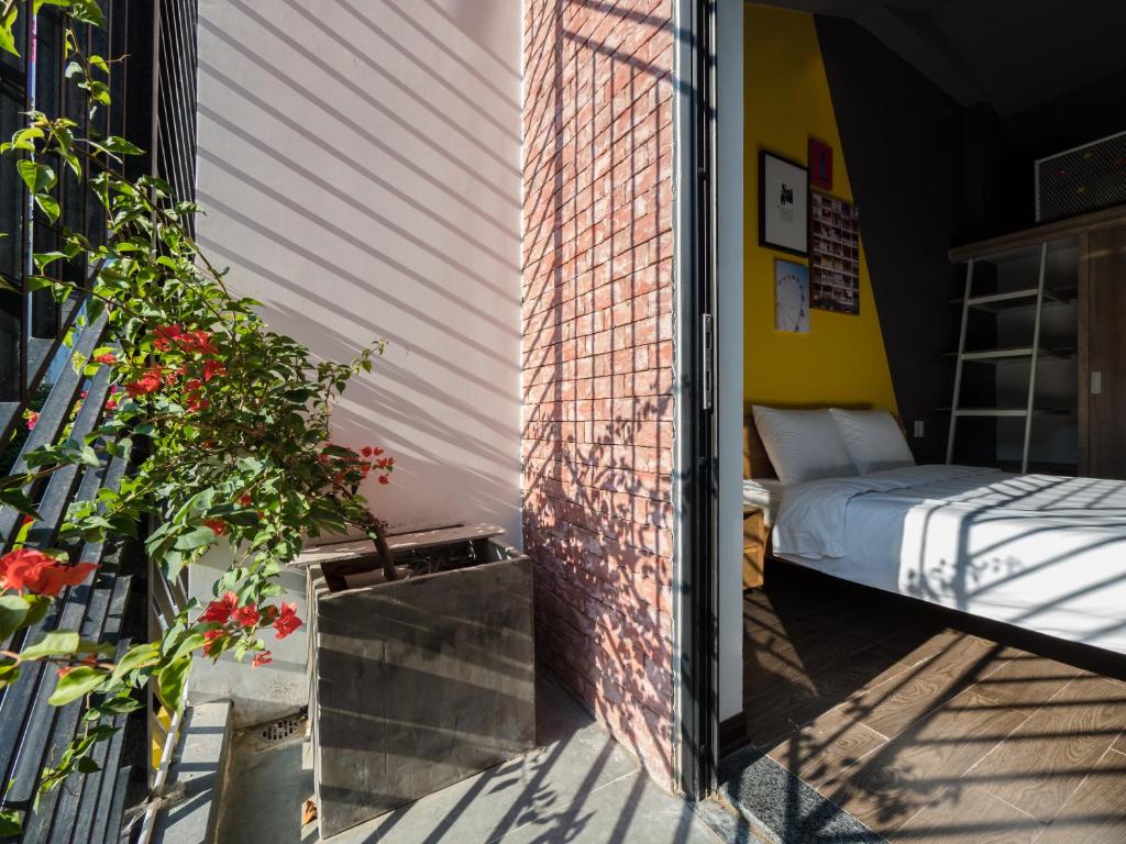 Ein Bett oder Betten in einem Zimmer der Unterkunft Wings House