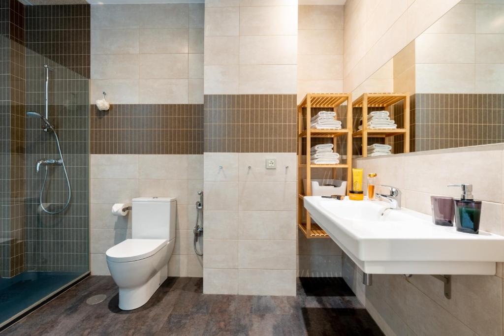 Łazienka w obiekcie Sevilla Central Suites Apartamentos Puerta Jerez