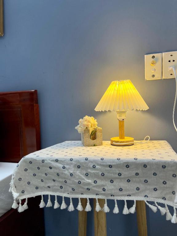 Giường trong phòng chung tại Eva Homestay