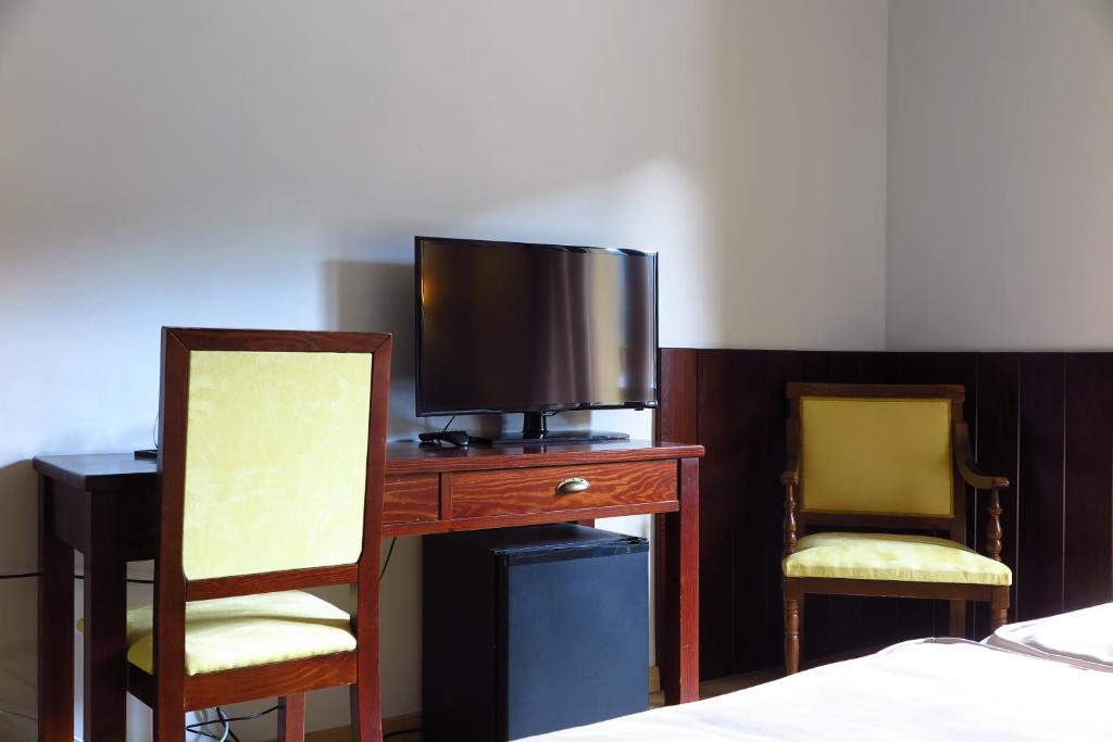 TV a/nebo společenská místnost v ubytování Snö Hotel Bielsa