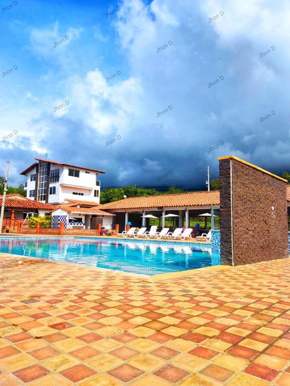 Bazén v ubytování Hotel Resort Campestre Puerta Del Sol - San Gil nebo v jeho okolí