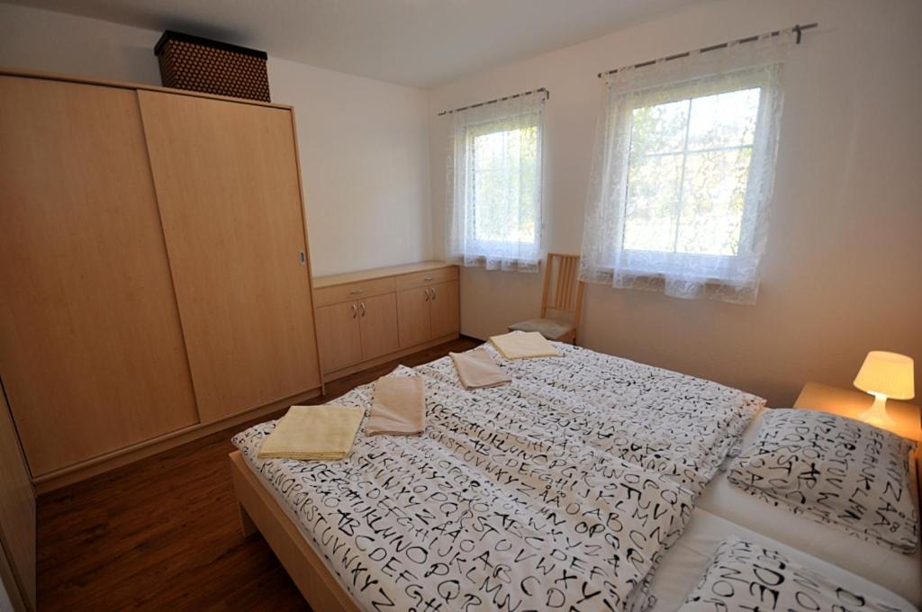 Postel nebo postele na pokoji v ubytování Chalupa pod vrškem