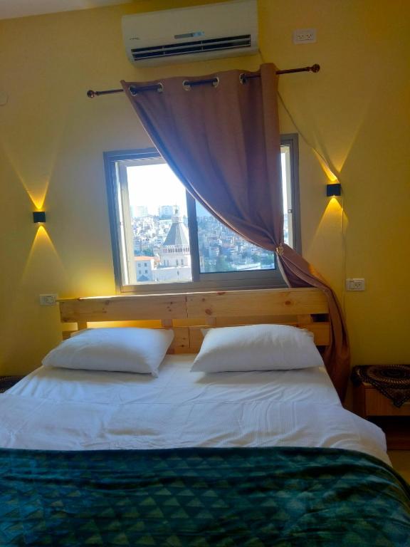 Postel nebo postele na pokoji v ubytování Seedi Yousef Hostel & Cafe