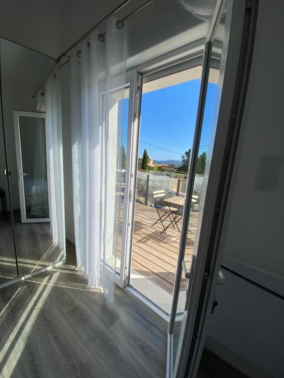 Balkón nebo terasa v ubytování O Bain Soleil