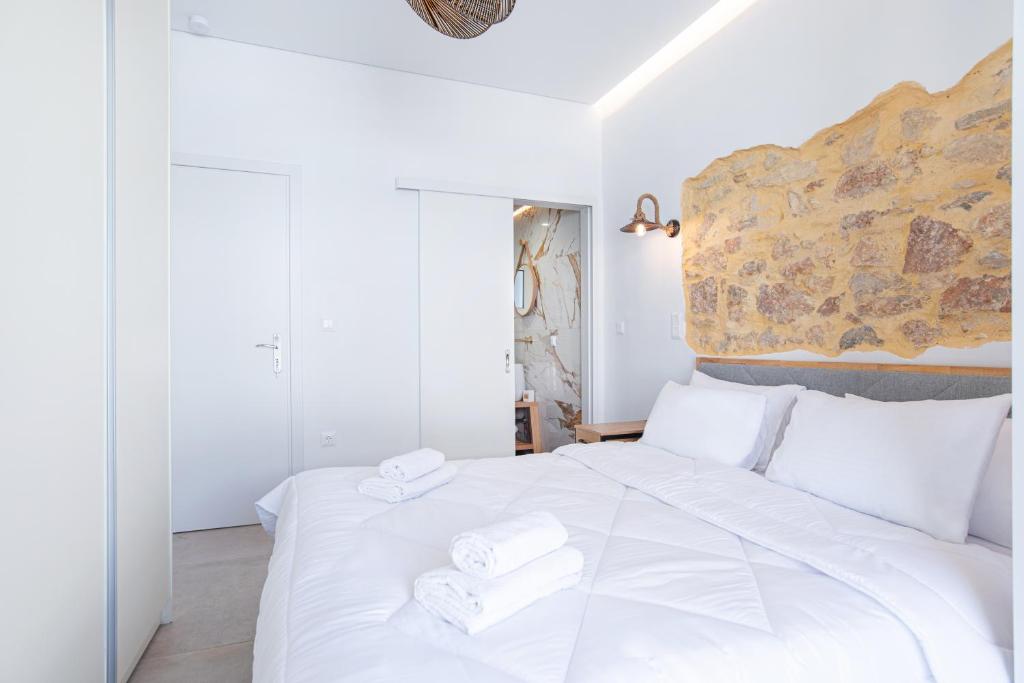 Posteľ alebo postele v izbe v ubytovaní 2bdroom Plaka Apartment