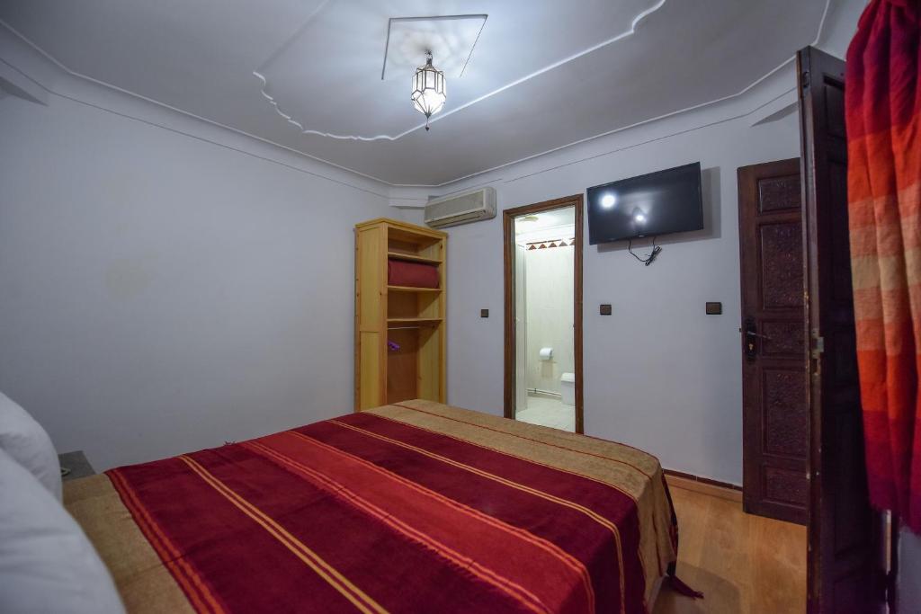 Postel nebo postele na pokoji v ubytování Riad Assia