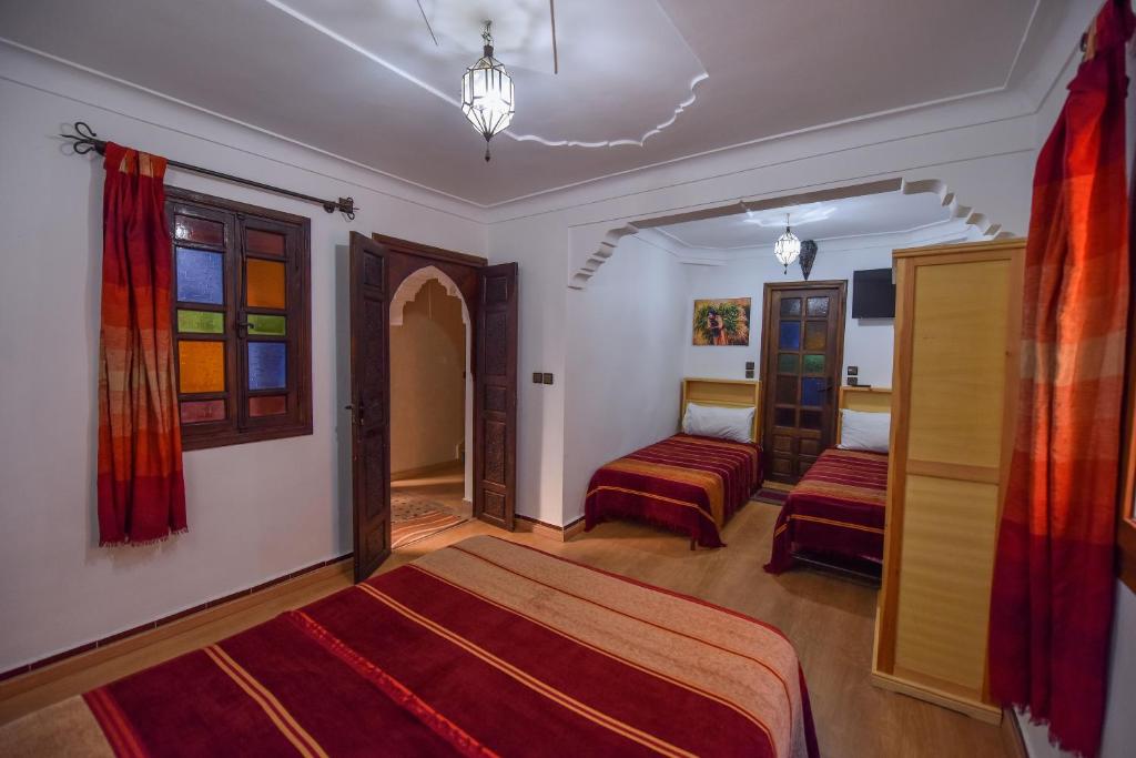 Postel nebo postele na pokoji v ubytování Riad Assia