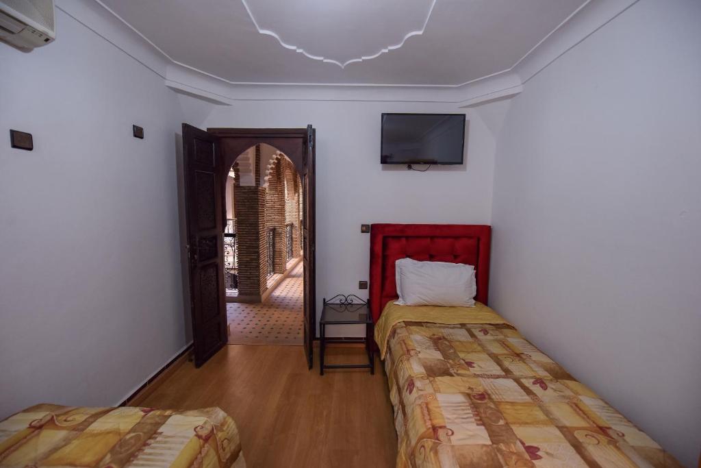 Postel nebo postele na pokoji v ubytování Riad Assia