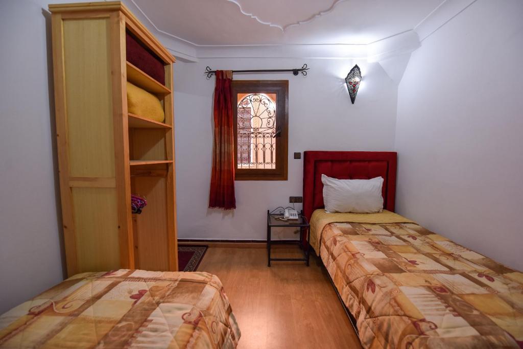 Postel nebo postele na pokoji v ubytování Riad Assia