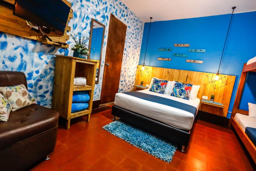 Uma cama ou camas num quarto em The Garden Lleras 10