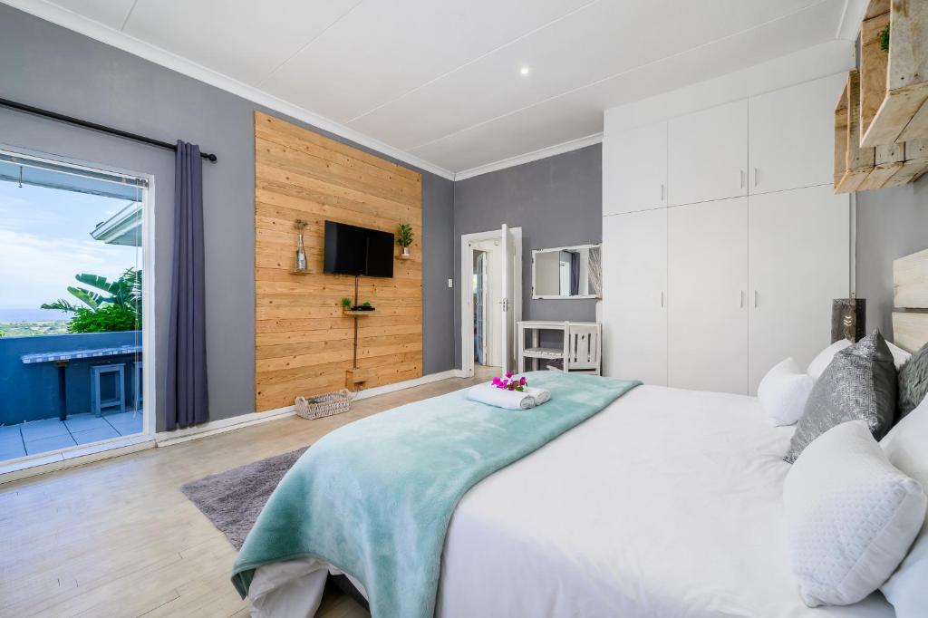 Ένα ή περισσότερα κρεβάτια σε δωμάτιο στο 302 On Old Sea View Road Chelsea