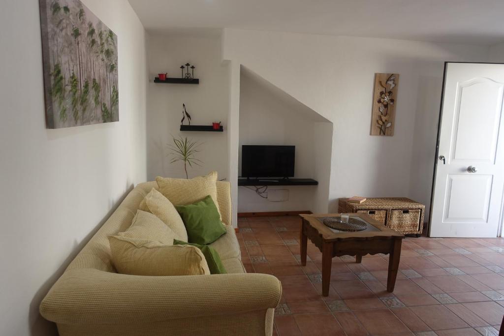 Televízia a/alebo spoločenská miestnosť v ubytovaní Galwey, tourist appartments with WIFI
