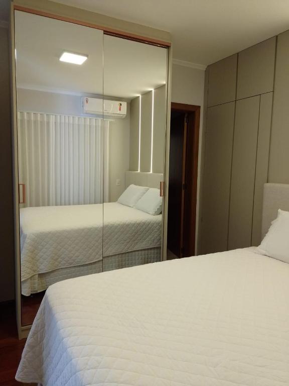 Postel nebo postele na pokoji v ubytování Locanda Montecielo - Vale dos Vinhedos