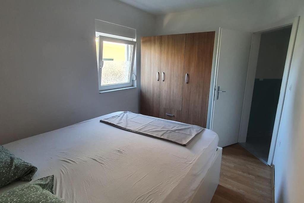 Postel nebo postele na pokoji v ubytování Apartment Divine Metković72m2
