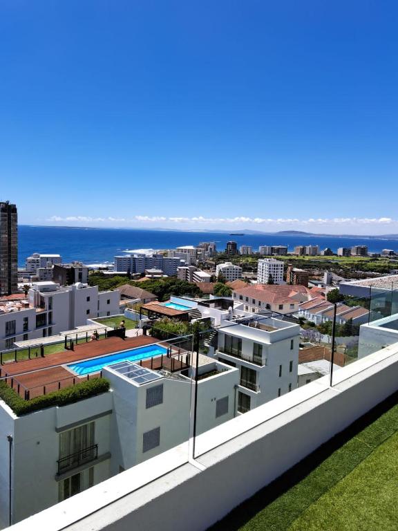 a view of the city from the balcony of a building at The Marlo Apartment in Cape Town