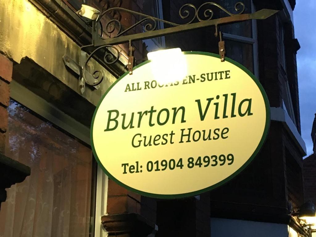 a sign for a burton villa guest house at Burton Villa Guest House in York