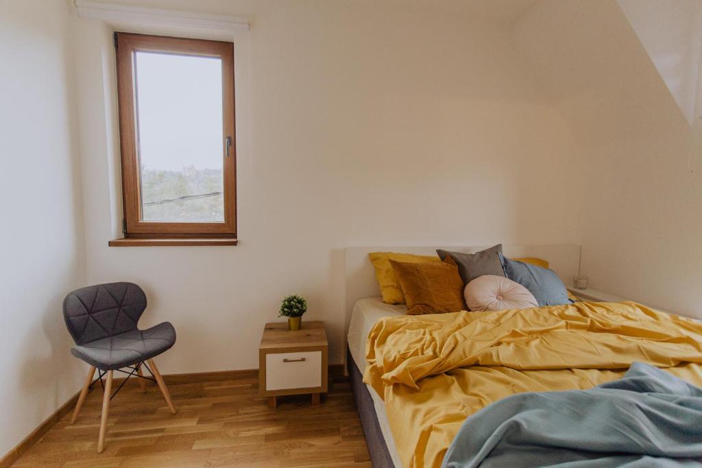 Letto o letti in una camera di Divcinova Moderan A10