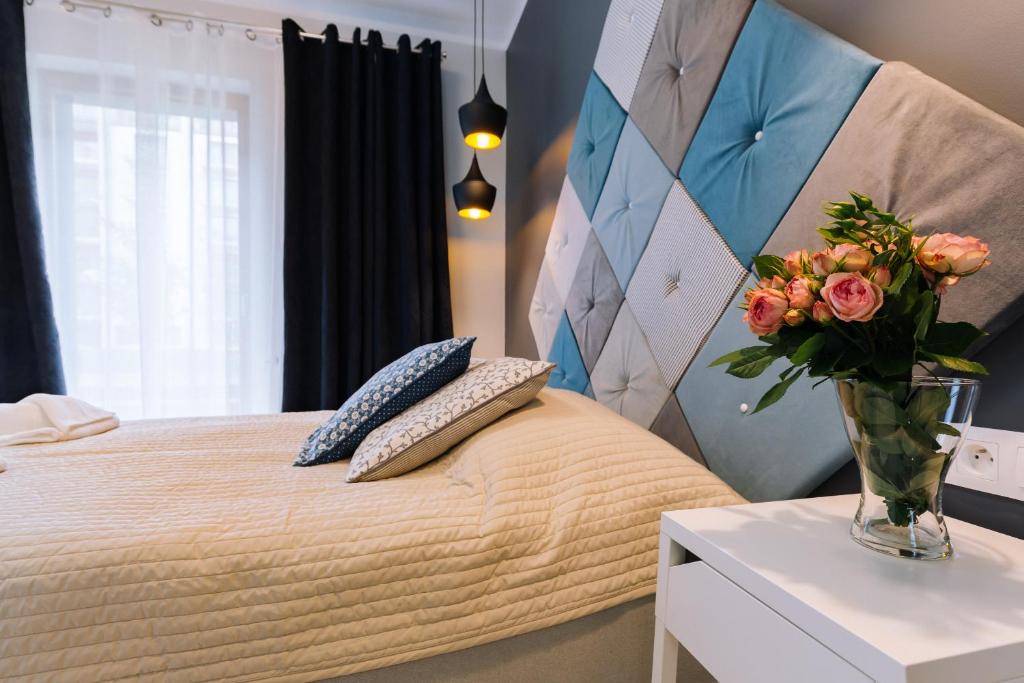 Posteľ alebo postele v izbe v ubytovaní ApartmentPrestige Central Station