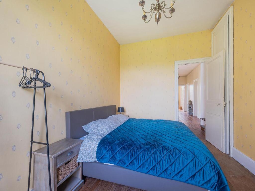 Postel nebo postele na pokoji v ubytování Holiday home adjoining a château