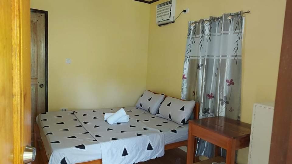 Voodi või voodid majutusasutuse Gardenview Homestay Siargao toas