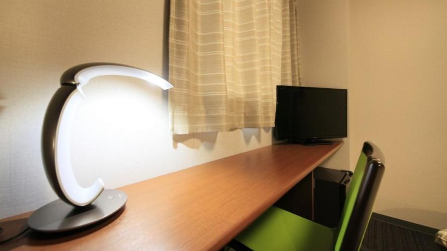 TV a/nebo společenská místnost v ubytování Hotel Coonel Inn