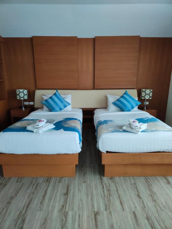 Postel nebo postele na pokoji v ubytování Phuket Jungle Experience Resort