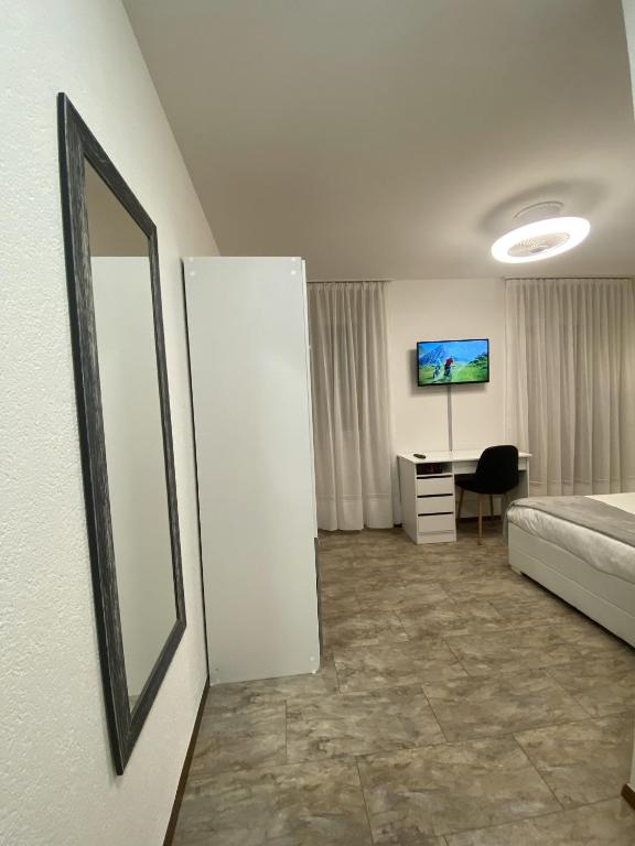 TV a/nebo společenská místnost v ubytování Albergo Stazione