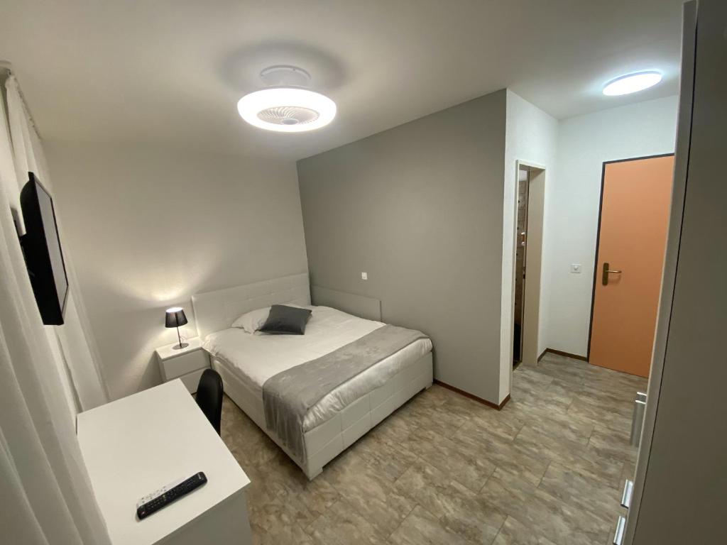 Postel nebo postele na pokoji v ubytování Albergo Stazione