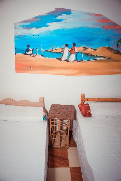 Letto o letti in una camera di Hamo Guest House