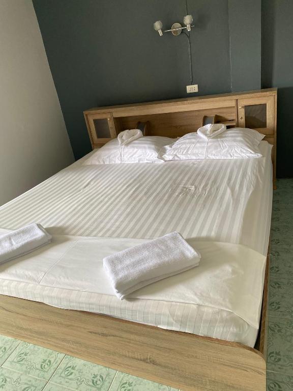 Postel nebo postele na pokoji v ubytování 2 Vikings Guesthouse