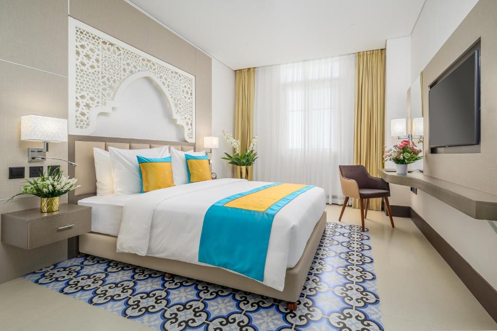 Postel nebo postele na pokoji v ubytování Central Inn Souq Waqif