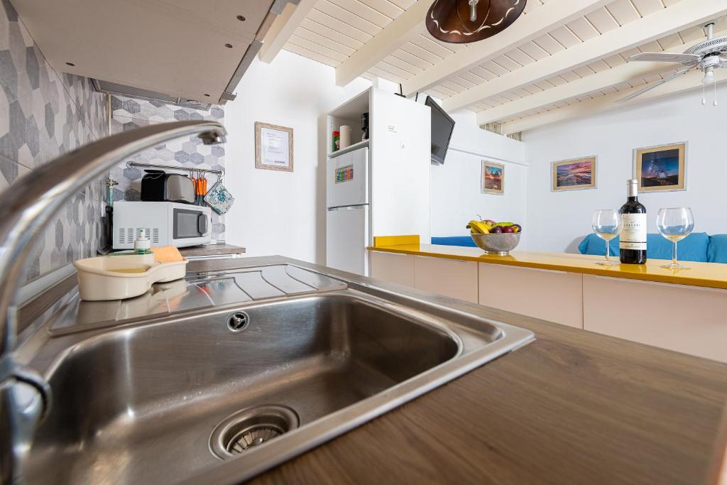 Kuchyňa alebo kuchynka v ubytovaní Mammanico Apartament