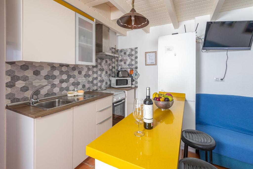 Kuchyňa alebo kuchynka v ubytovaní Mammanico Apartament