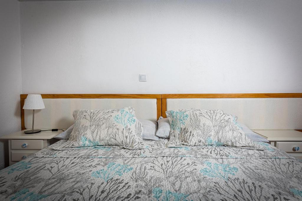 Posteľ alebo postele v izbe v ubytovaní Mammanico Apartament